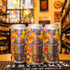 Lata de 450 North Confetti Candy, una Slushy/Fruited Sour de 450 North Brewing Company. La etiqueta colorida muestra un gran vaso de granizado con pajilla, sobre un fondo vibrante con confeti y formas geométricas. ABV de aproximadamente 6%, con notas dulces de frutas tropicales y caramelos. Ideal para disfrutar sola como postre o con platos ligeros. Diseño festivo y llamativo que resalta su estilo frutal.