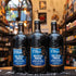 Botella de St. Peter's Old Style Porter, una porter tradicional de St. Peter's Brewery con un ABV de 5.1%. La etiqueta es de color azul con detalles en blanco y negro. Presenta aromas de malta tostada, regaliz, y frutas oscuras. Su sabor es complejo, con notas de chocolate amargo, toffee y un final ligeramente dulce. Ideal para maridar con carnes asadas y postres de chocolate.